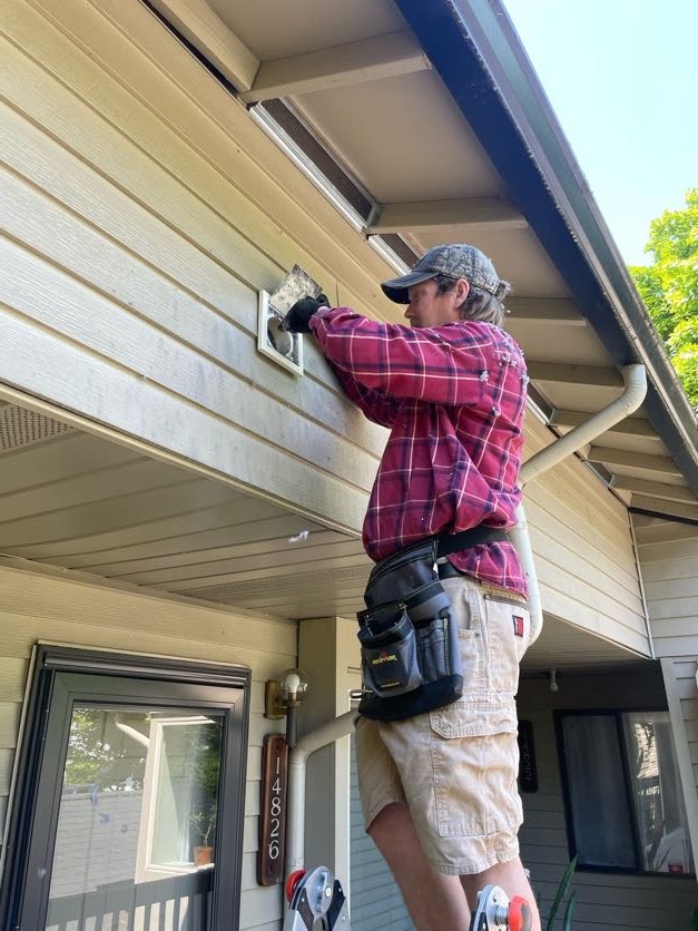 Cody fixing a dryer vent